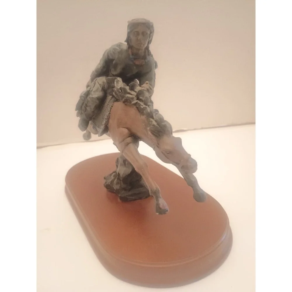 Native American Warrior On Horseback Statue